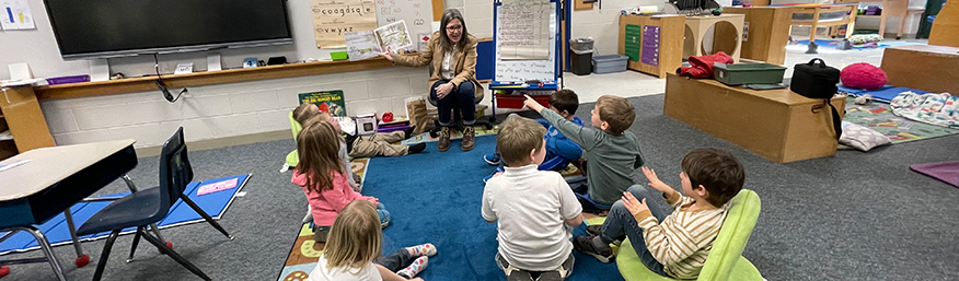 Superintendent Stanton reading to kindergarten students